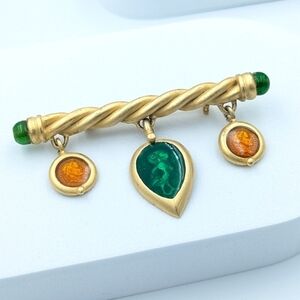 Gold tone and enamel charm bar brooch pin